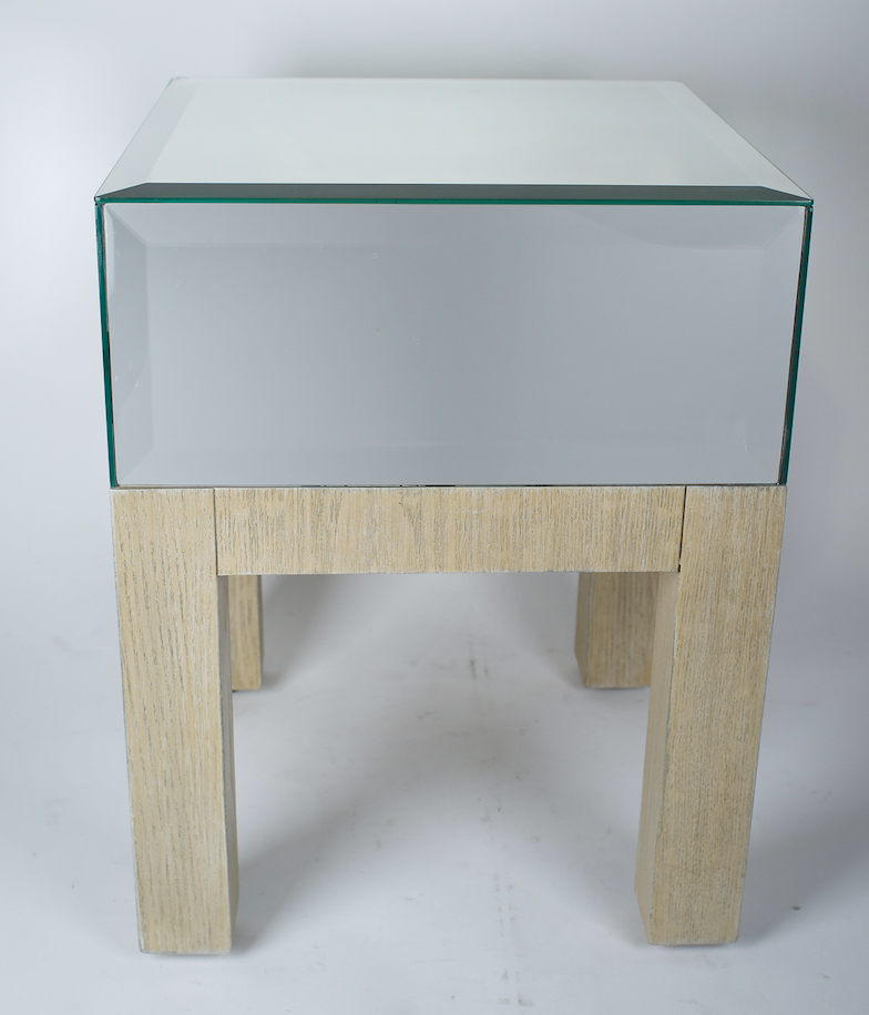 Beveled mirror side table with blonde wood legs