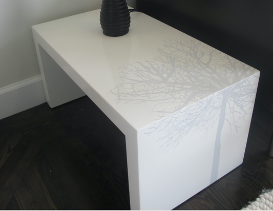 White side table with silver silkscreened tree