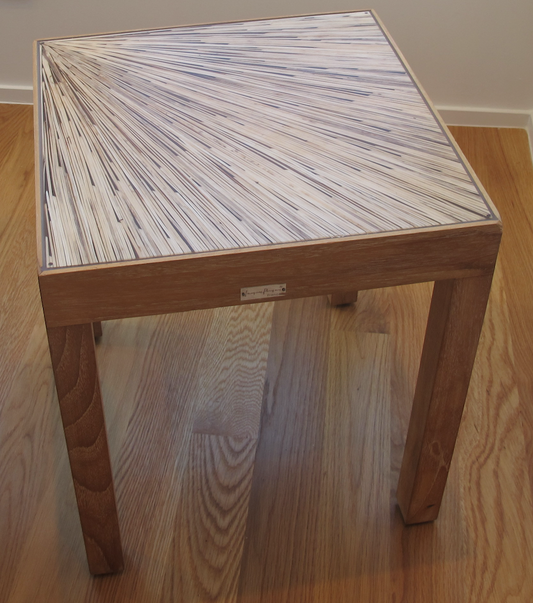 Light wood side table with fanned wood top