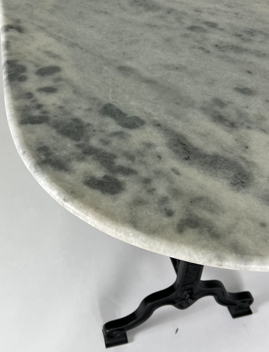 White and gray marble, racetrack shaped table or desk, black iron base