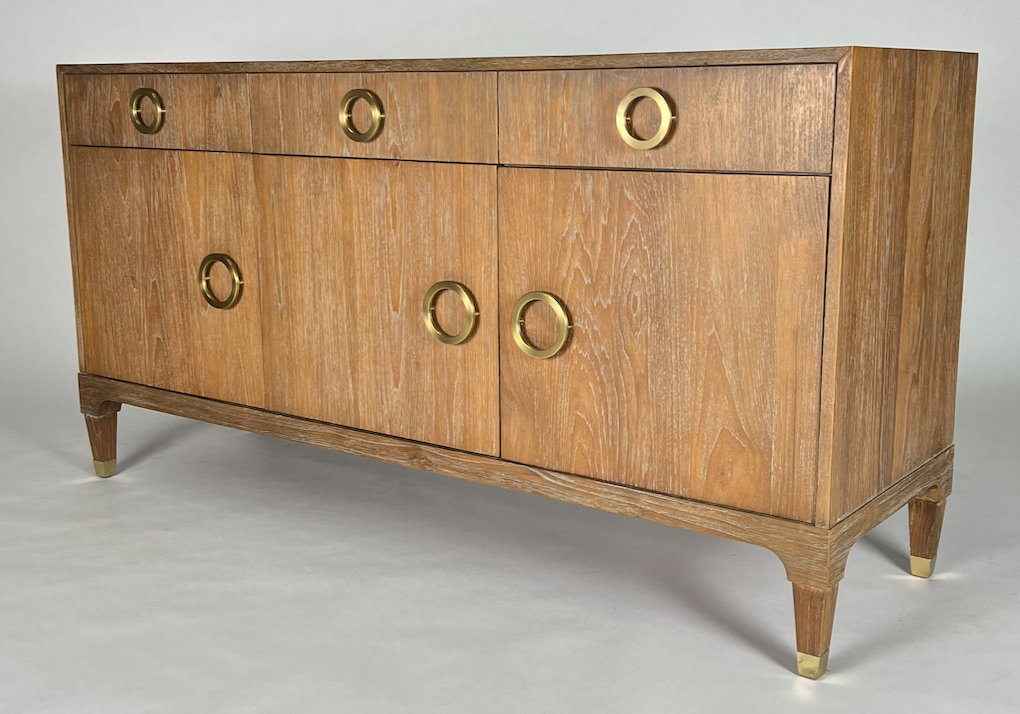 Cerused oak buffet with circular brass hardware