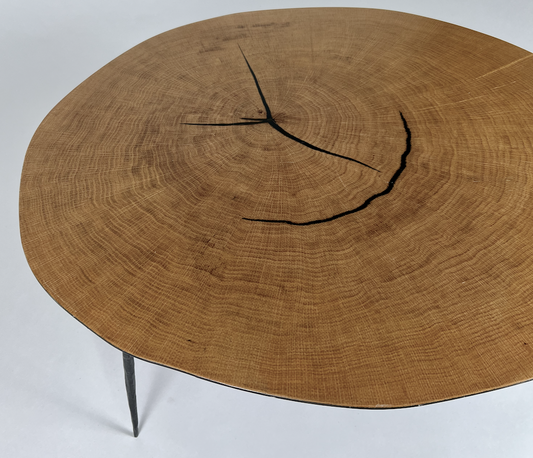 Wood looking metal coffee table with 3 tapered metal legs