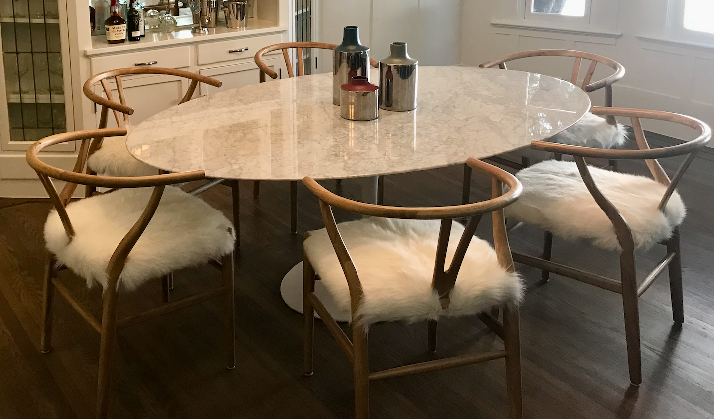 Oval white Carrera marble Saarinen like dining table with white pedestal base