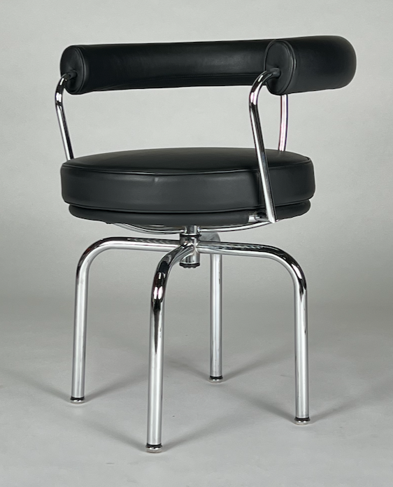 Le Corbusier LC7 swivel base, black padded armchair, signed