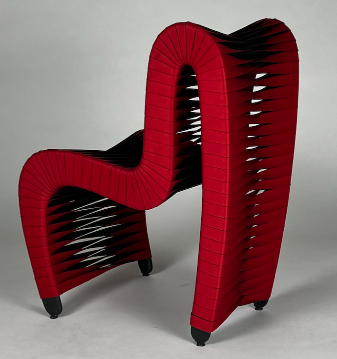 Curvaceous red seat belt chair