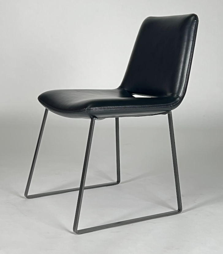 Black leather chair with black iron frame