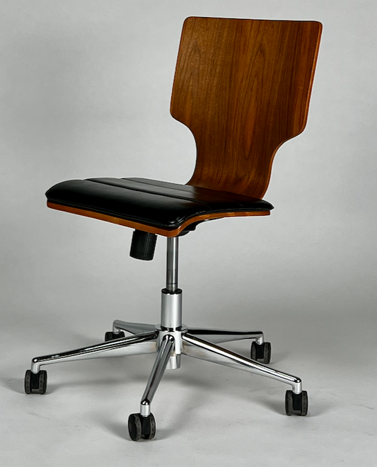 Walnut rolling desk chair with black padded seat