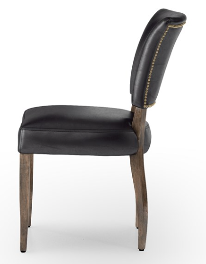 Black leather dining chair with brown legs and nail head trim