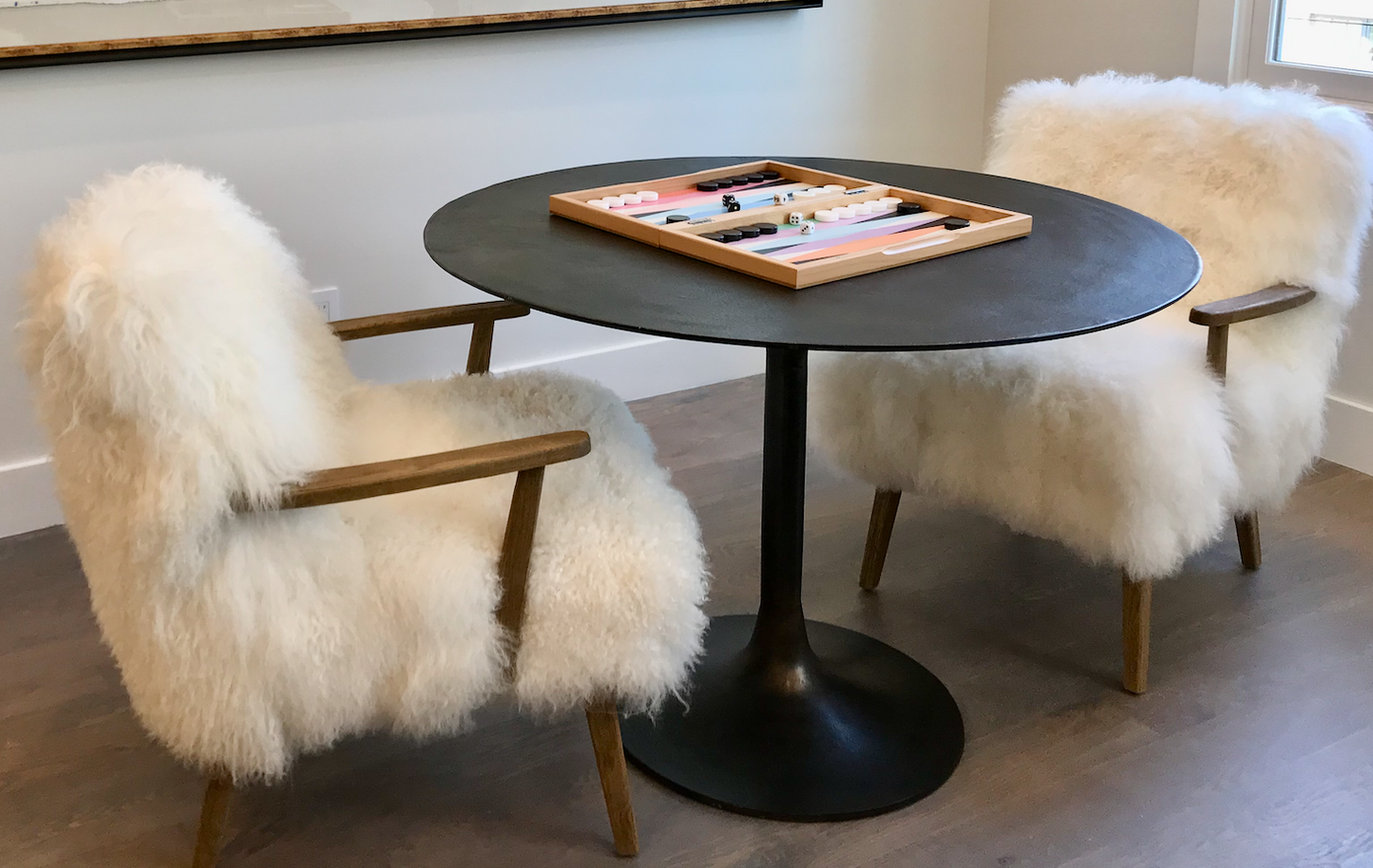 Round antique rust dining table with tulip pedestal base