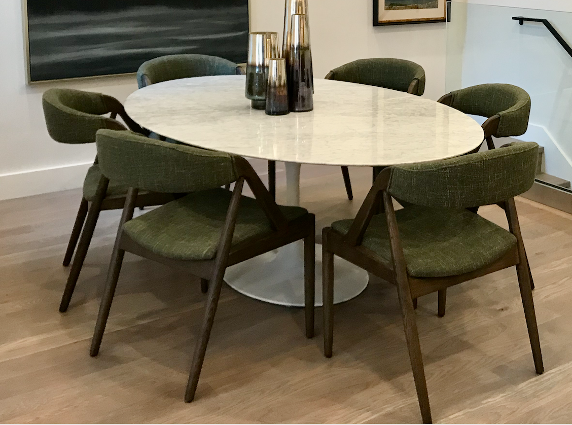 Oval walnut Saarinen like dining table with white pedestal base