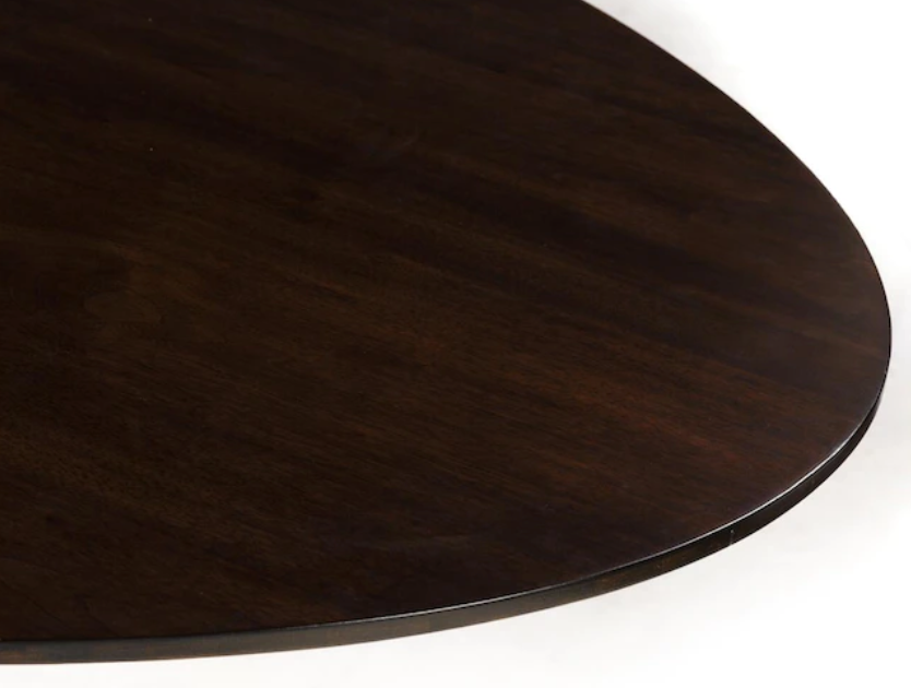 Polished dark wood oval dining table with bronzed pedestal base