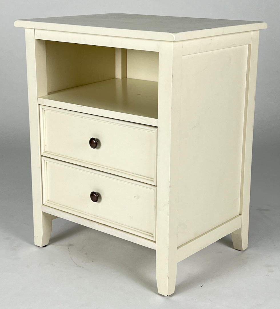 White night stand with two drawers and an open cubby